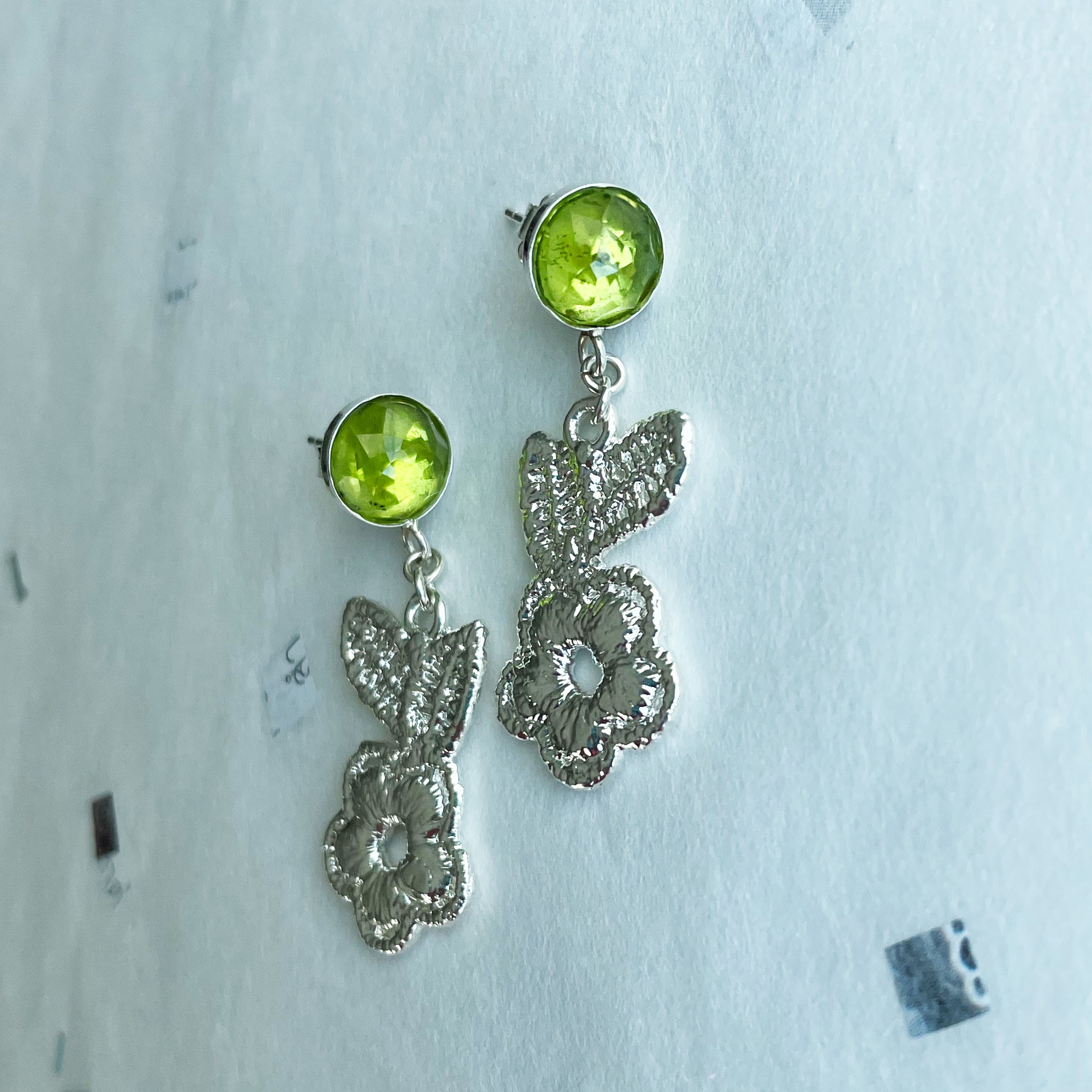 Peridot earrings with lace flowers in sterling silver.