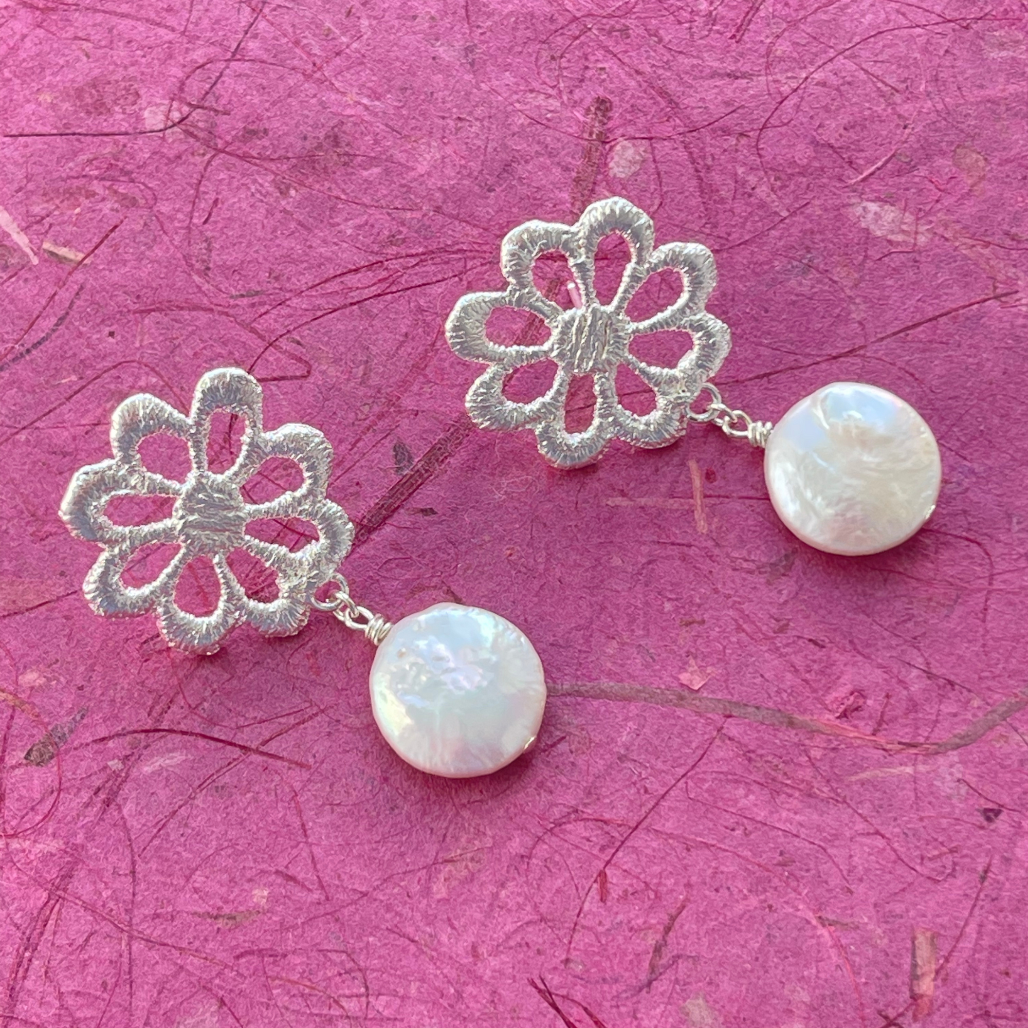 Baroque coin pearl earring with flower lace in sterling silver.
