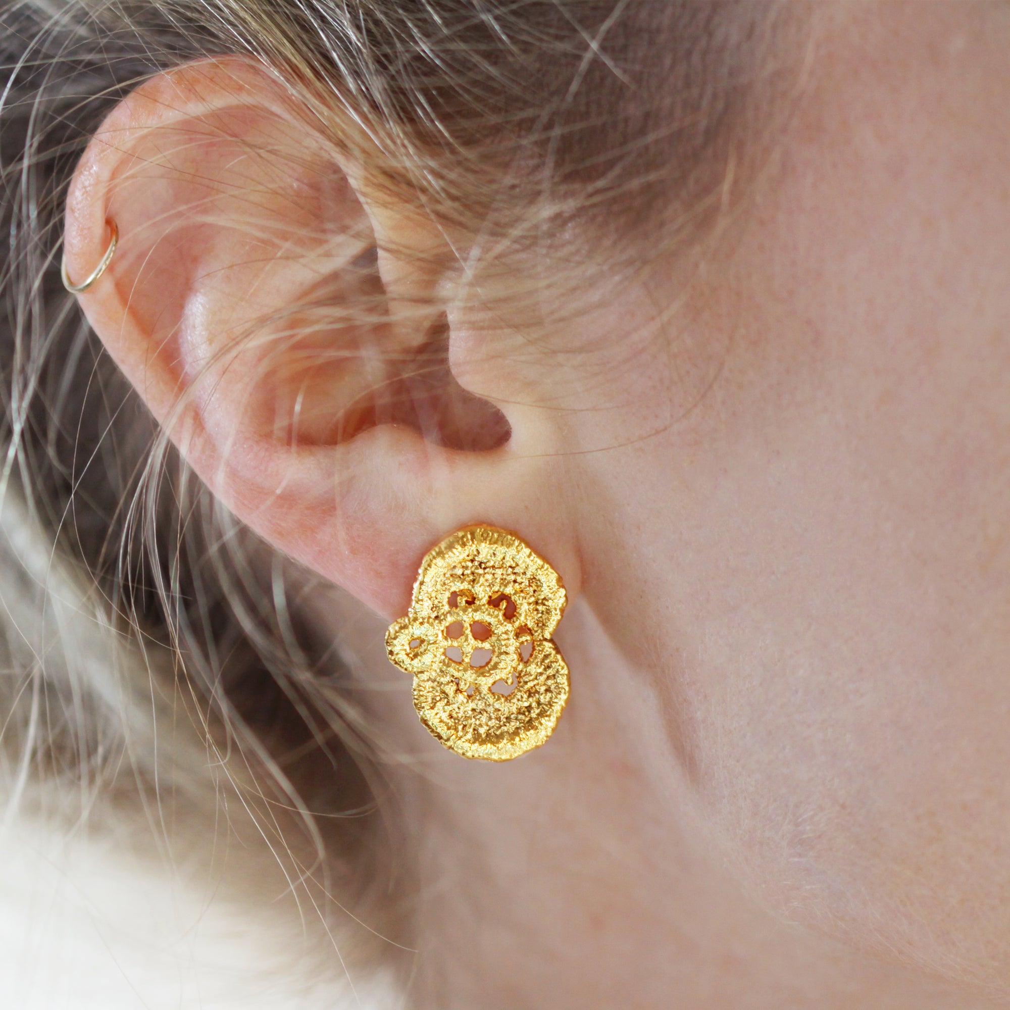 Sophisticated stud earrings made from lace dipped in 24k gold.