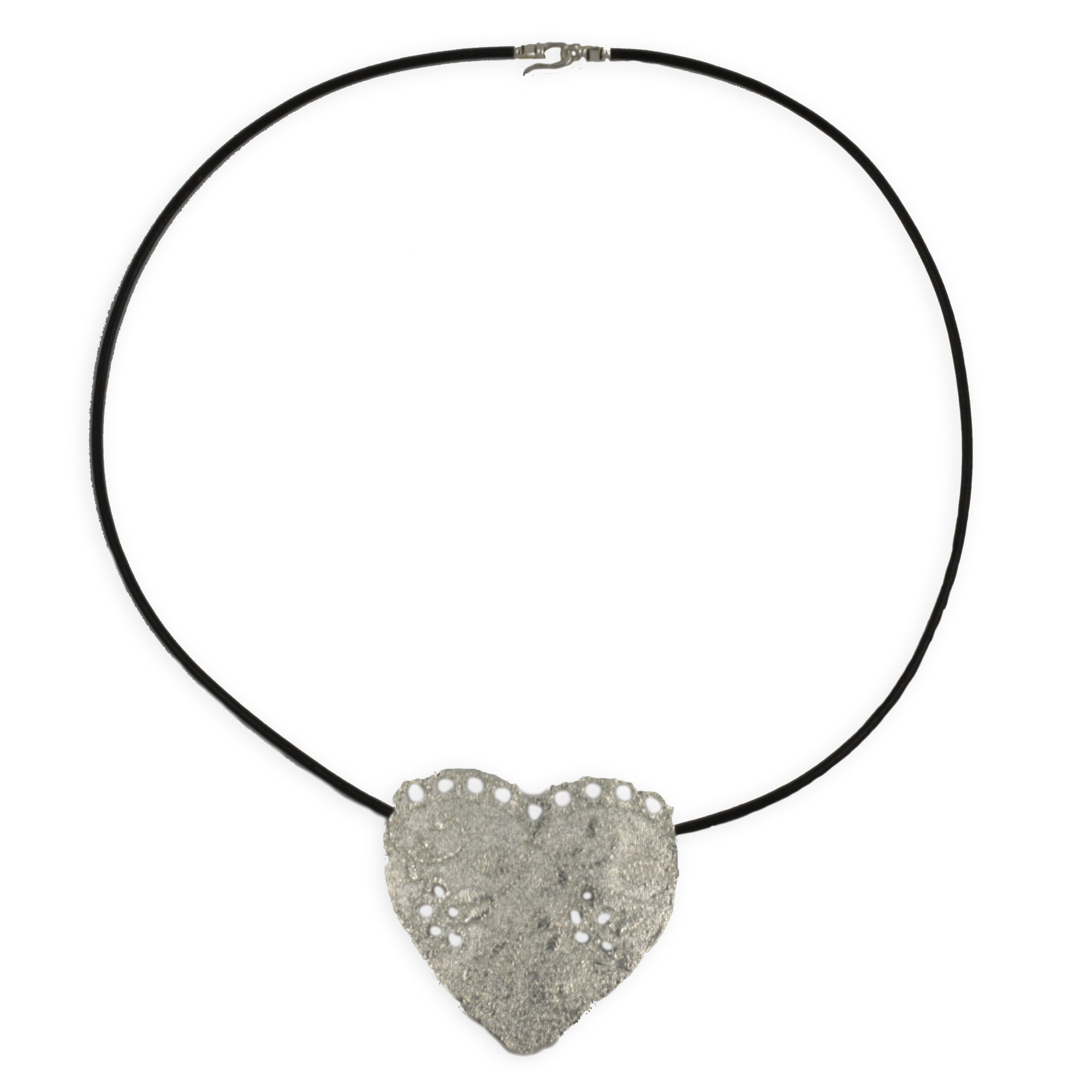 Lace heart necklace in 24k gold with a leather cord.