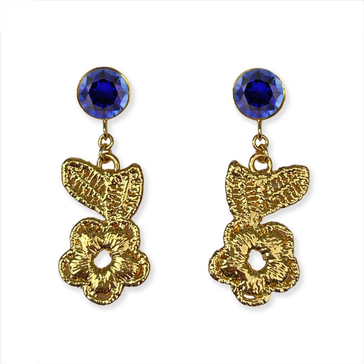 Flower lace earrings in 24k gold with blue sapphires.