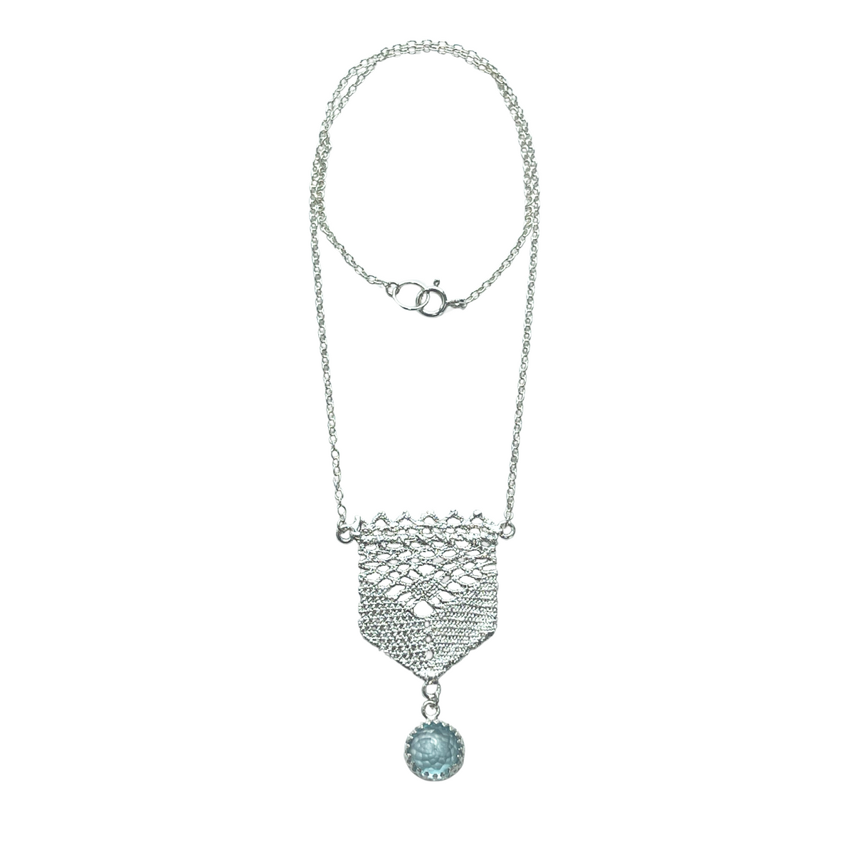 Lace pendant in silver with a faceted Aquamarine stone.
