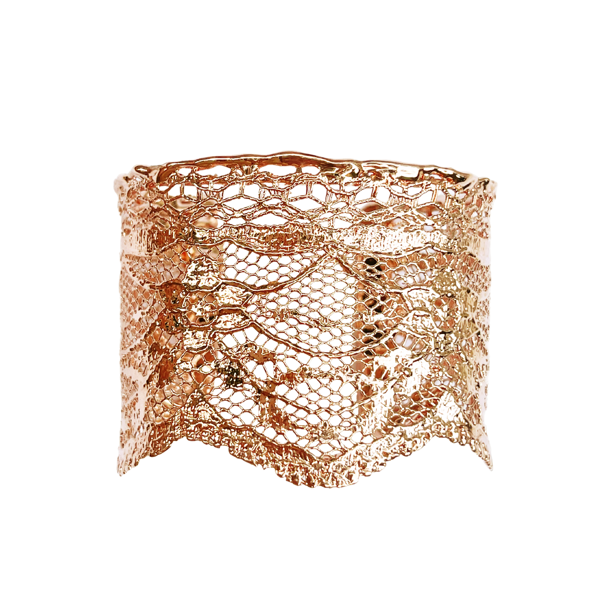 Intricate lace cuff bracelet in rose gold.