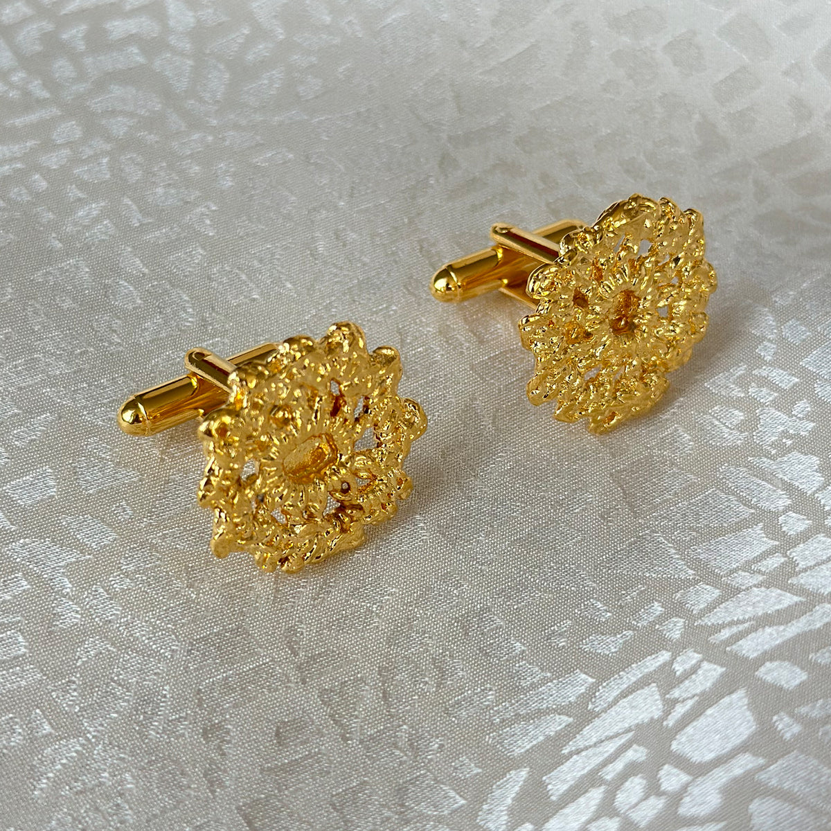 The Emil cufflinks made from Swedish lace dipped in 24k gold.