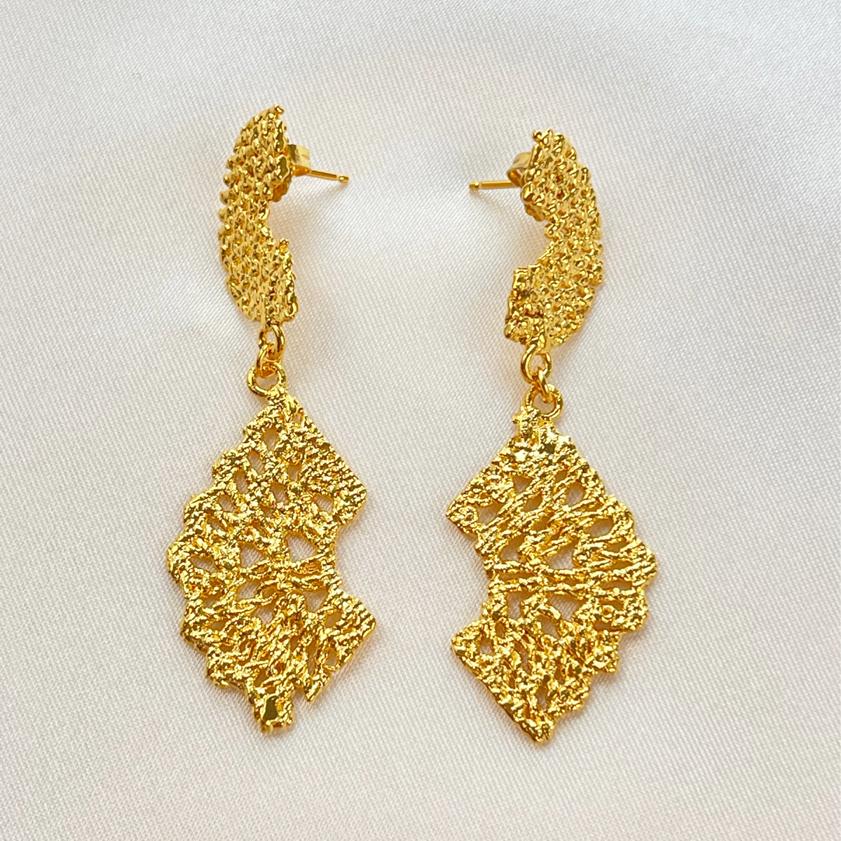 Dangle lace earrings dipped in 24k gold.