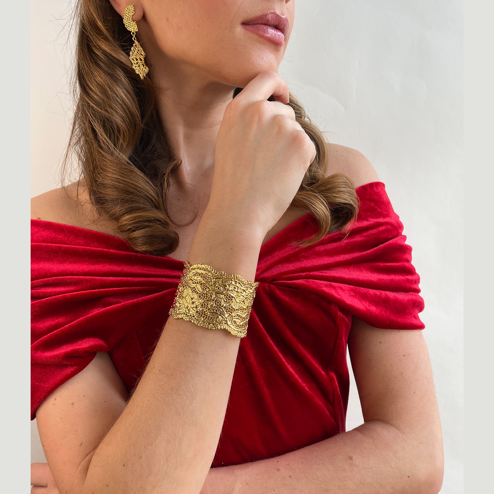 Lace cuff bracelet made from antique double scalloped lace dipped in 24k gold.