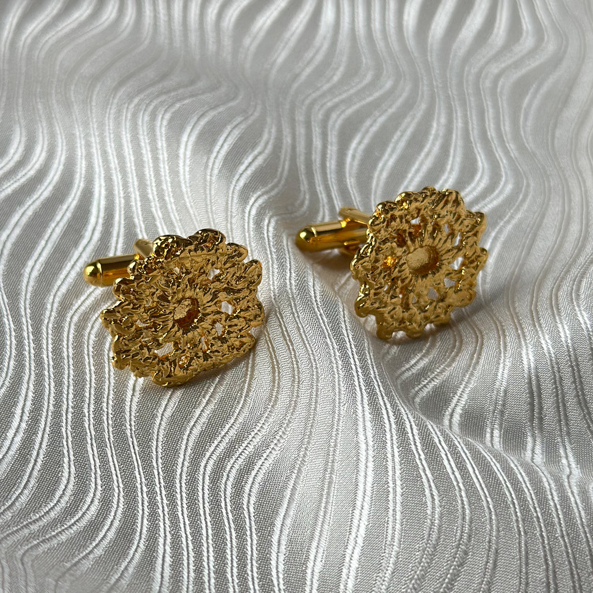 The Emil cufflinks made from Swedish lace dipped in 24k gold.