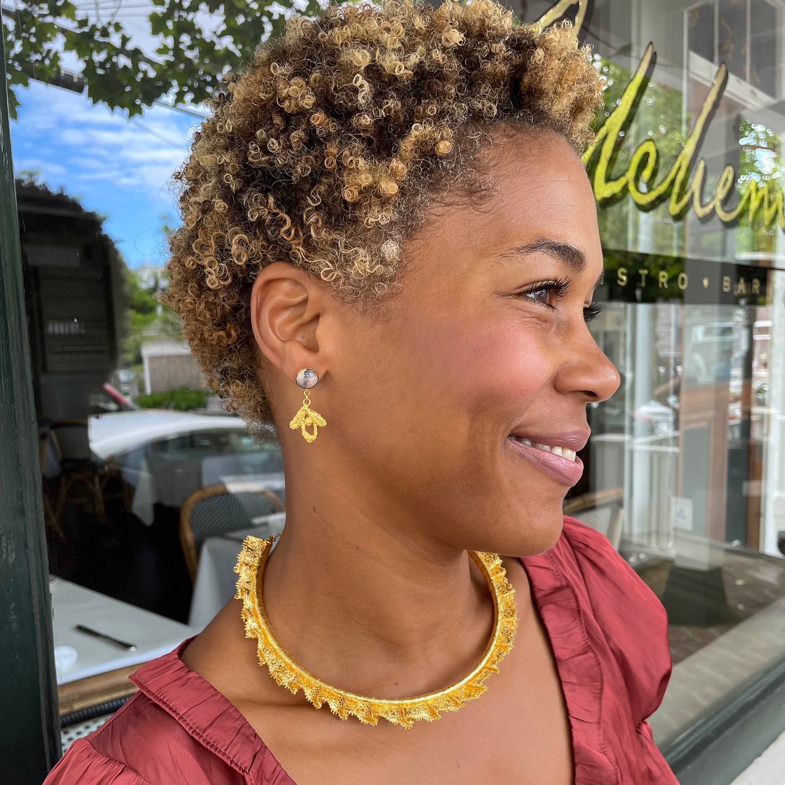 Lace choker in 24k gold with adjustable back chain.