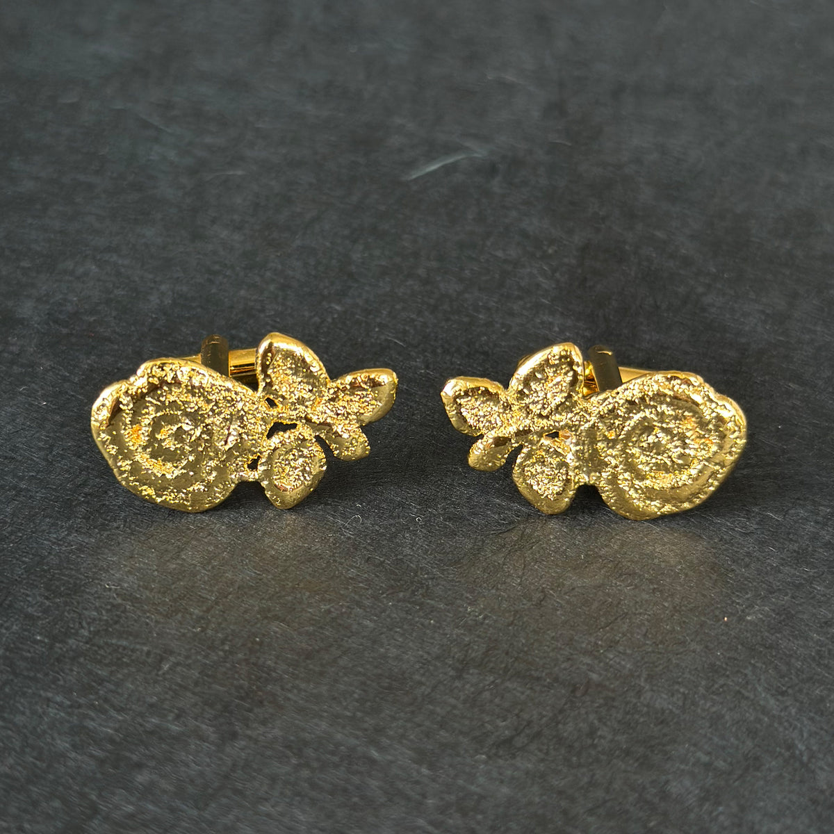 Albie lace rose cufflinks in 24k gold.