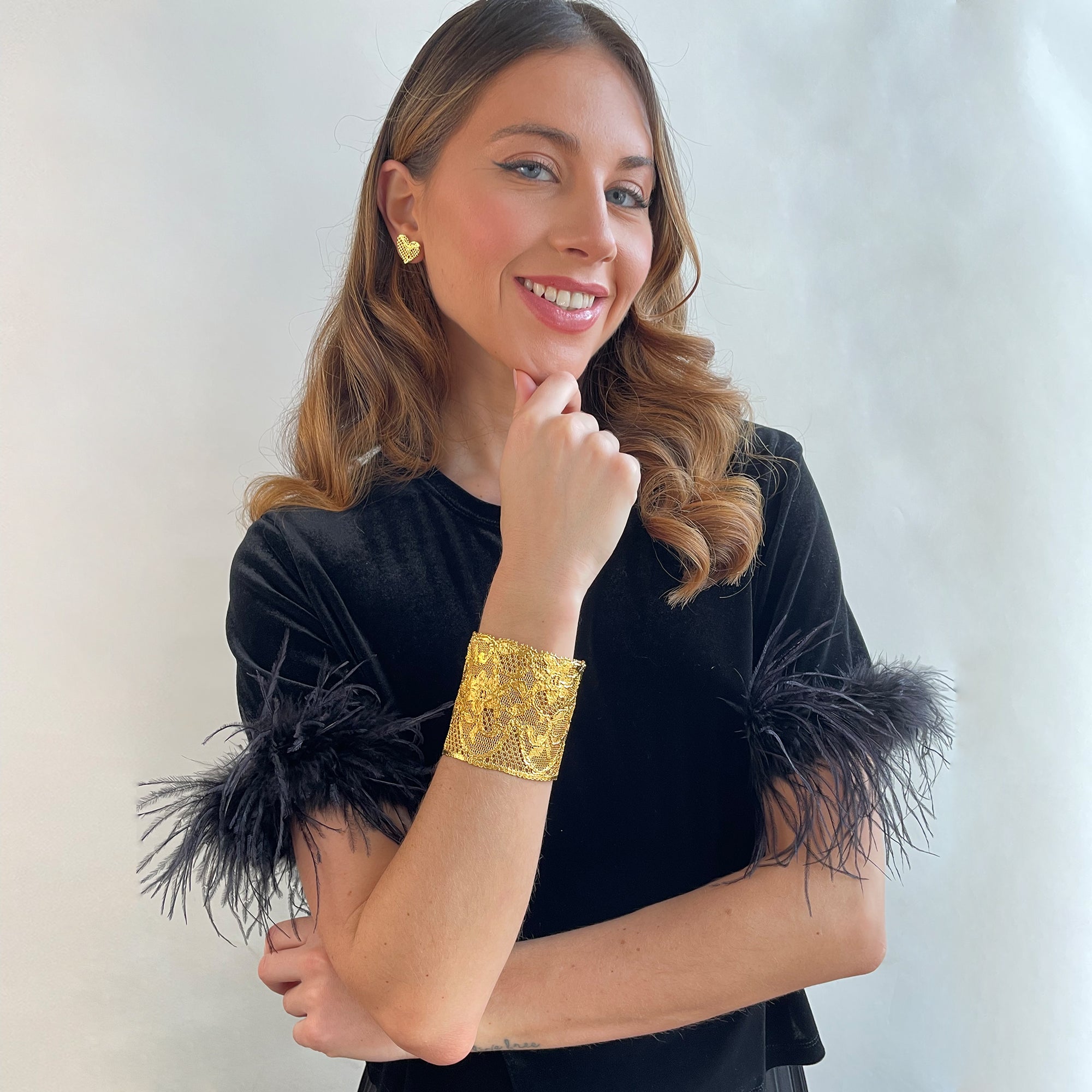 The Dorothy lace cuff in 24k gold made with American 1940s lace.