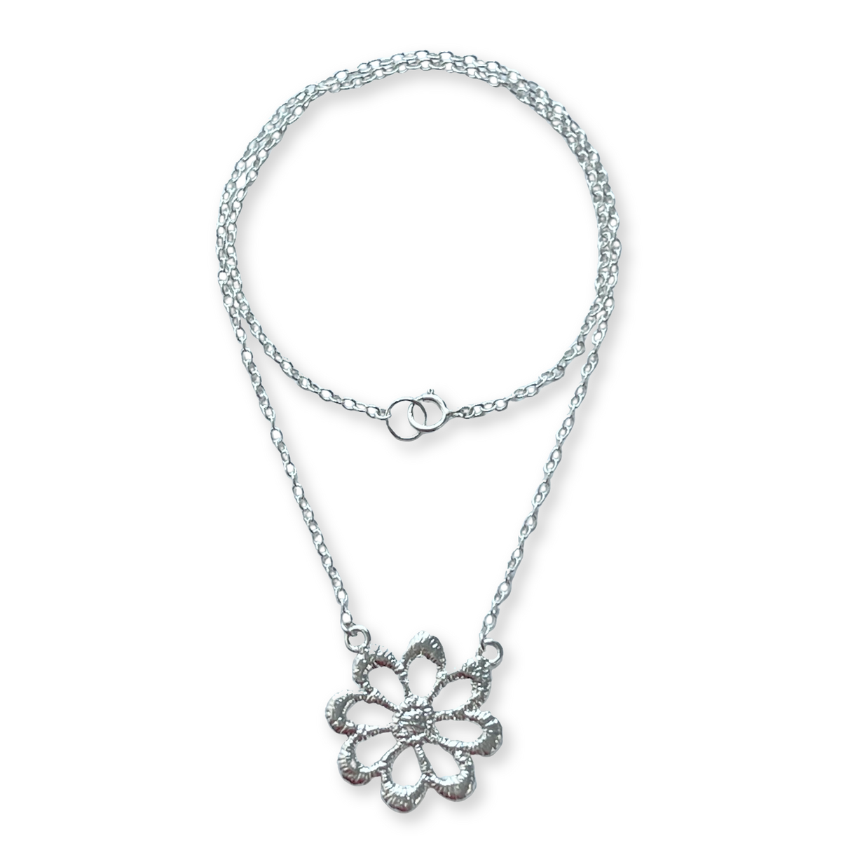 Lace flower necklace in sterling silver.