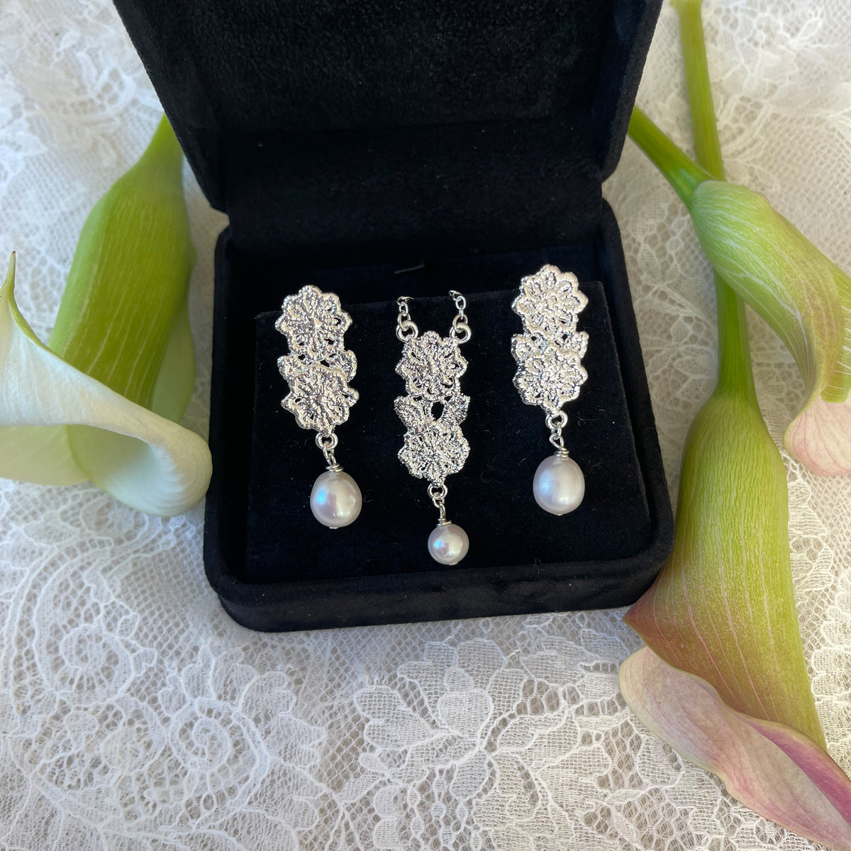 Gift set with silver lace pearl earrings and silver lace pearl pendant necklace.