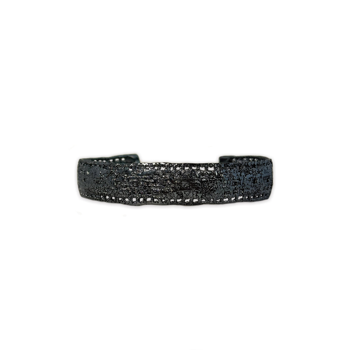 A men's lace bracelet in dipped oxidized sterling silver.