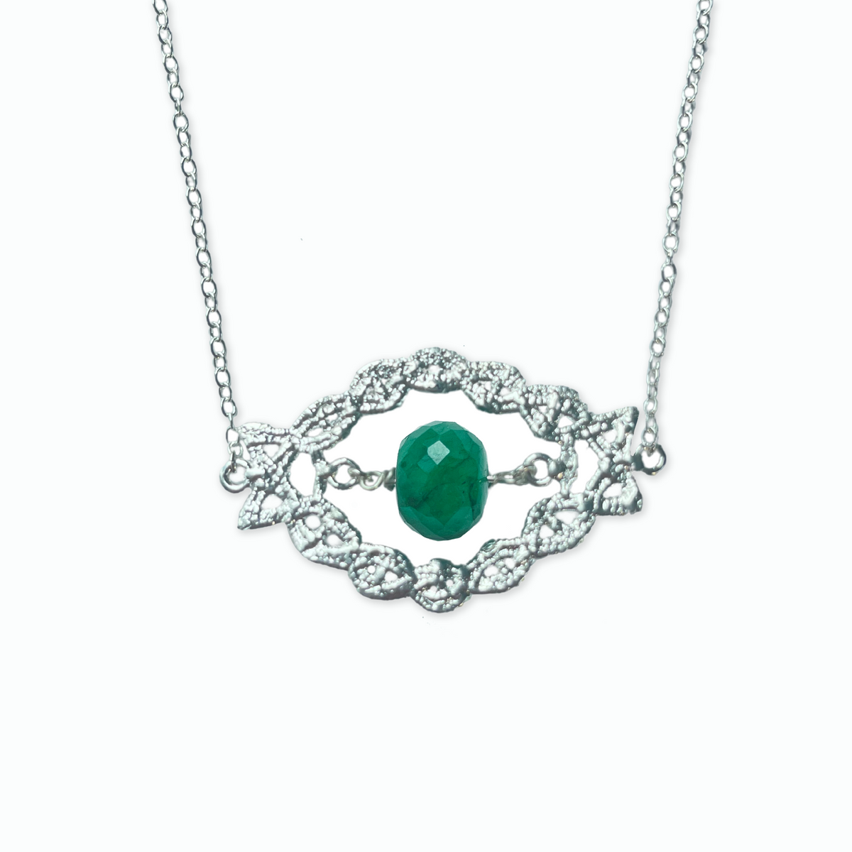 Chloé sterling silver lace pendant with an Emerald centerpiece.