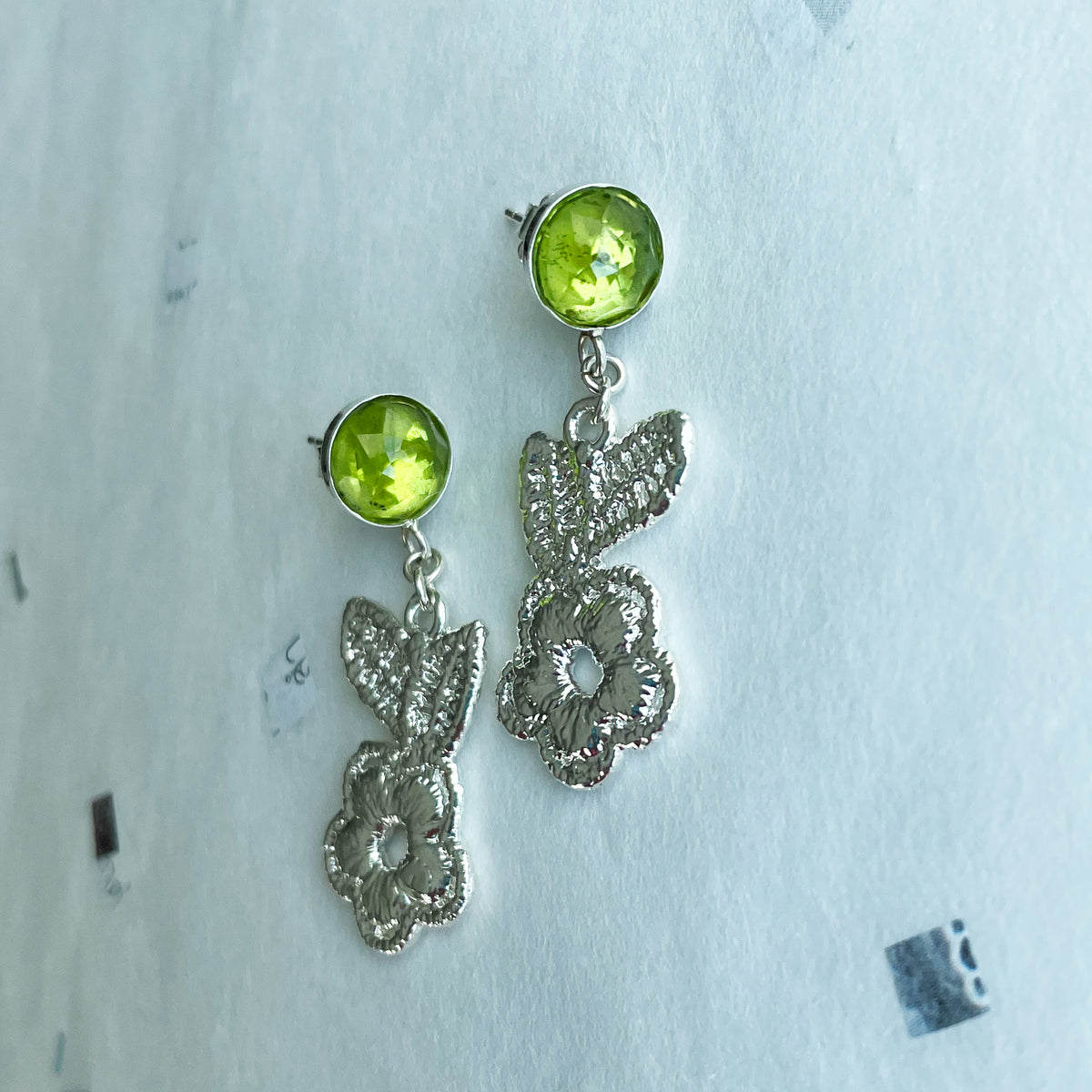 Peridot earrings with lace flowers in sterling silver.