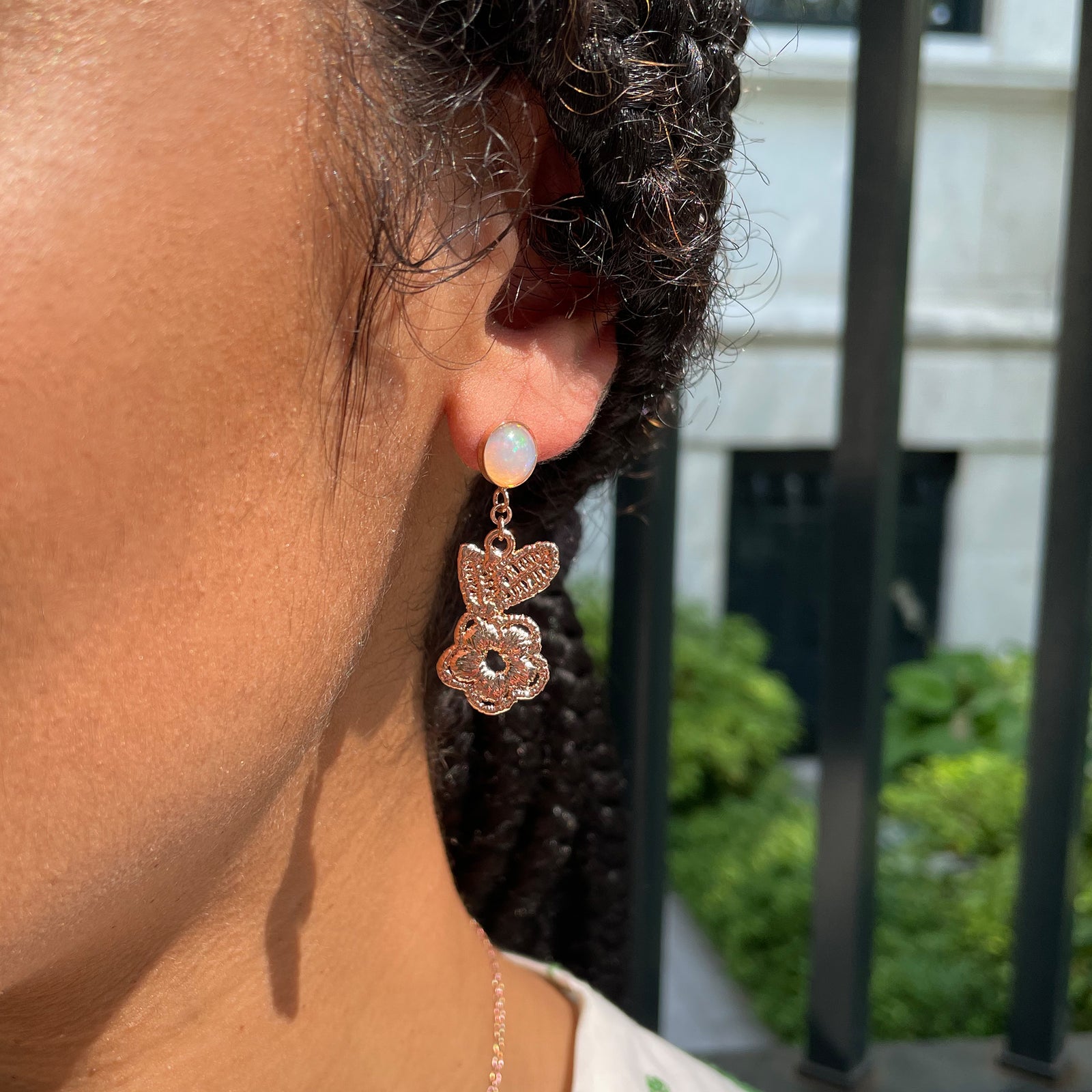 Flower lace earrings in rose gold with opals.