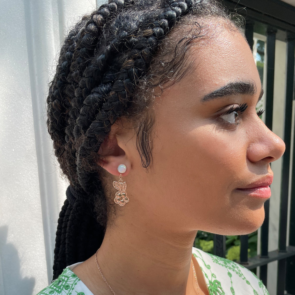 Flower lace earrings in rose gold with opals.