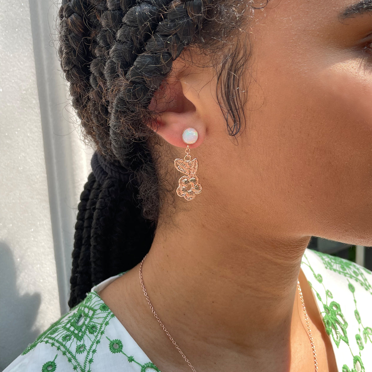 Flower lace earrings in rose gold with opals.
