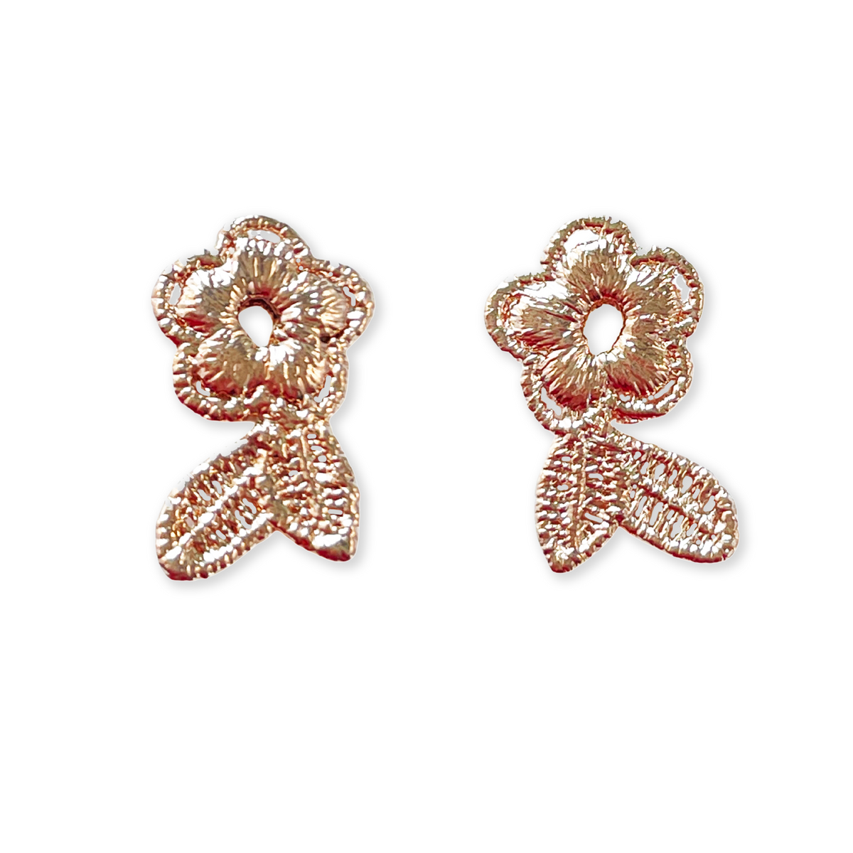 Flower lace stud earrings in rose gold.