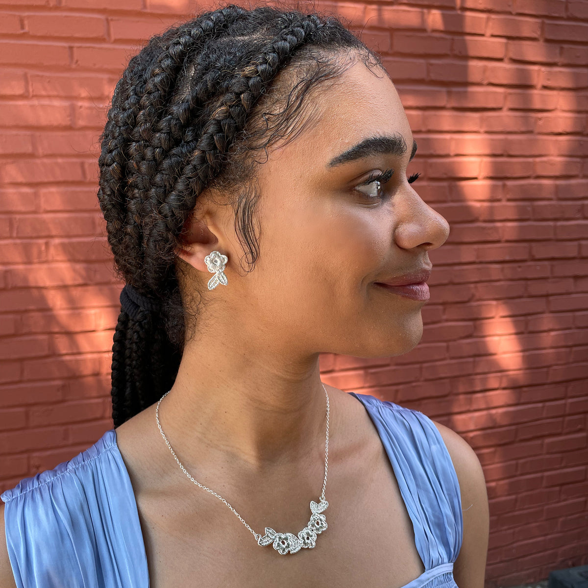 Flower lace stud earrings and lace necklace in sterling silver.