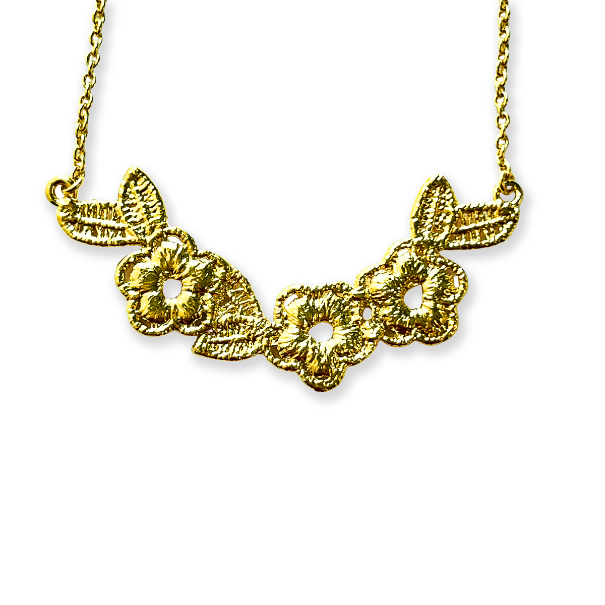 Lace flower garland necklace in 24k gold.