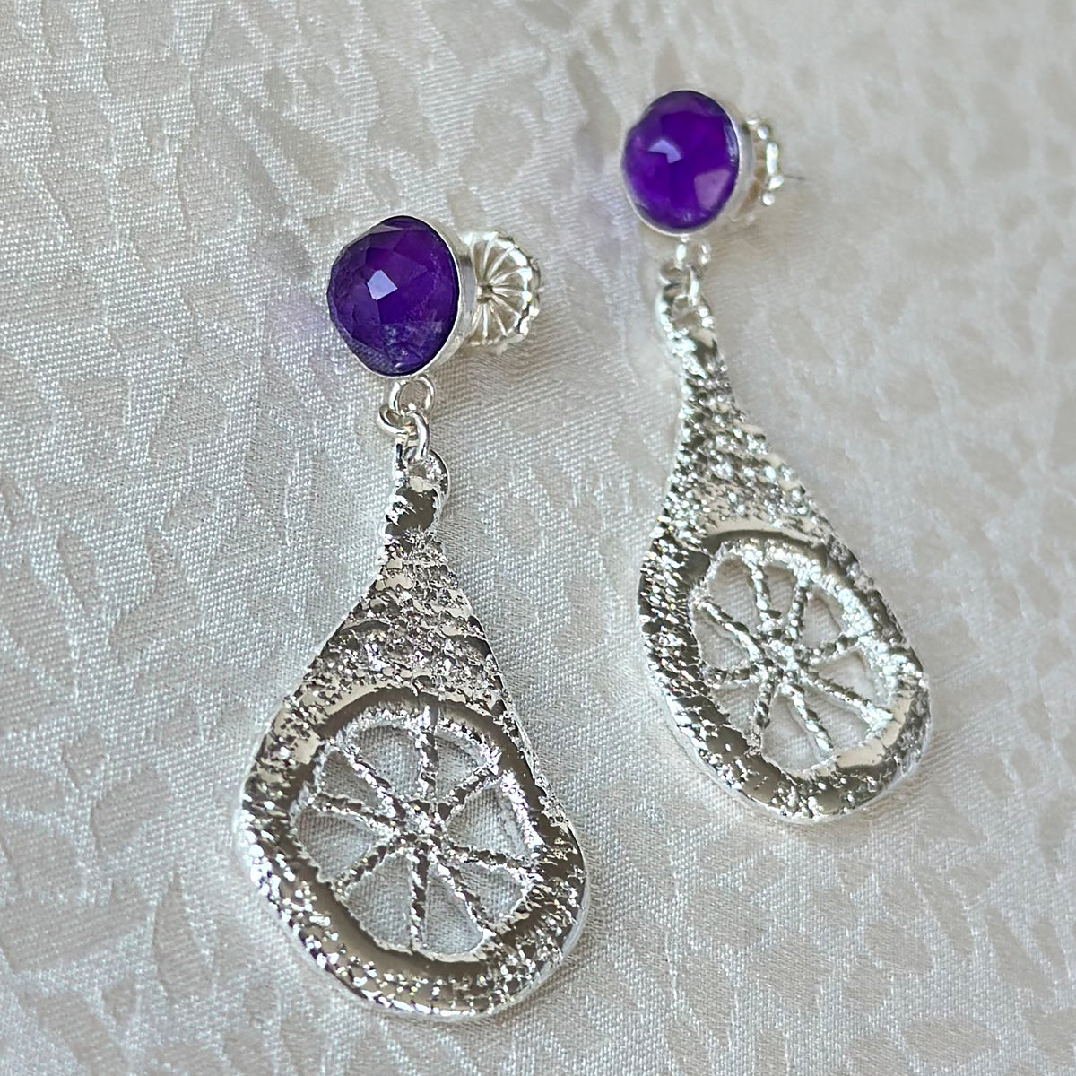 Lace teardrop earrings in sterling silver with amethysts.