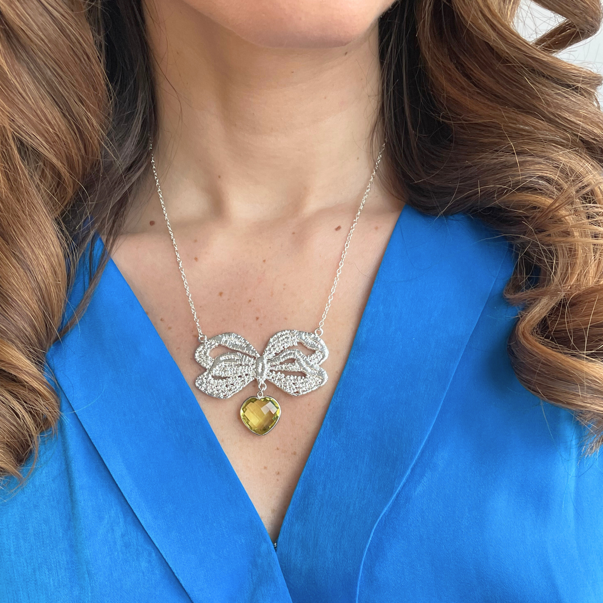 Necklace with lace bow in silver and heart Citrine stone.