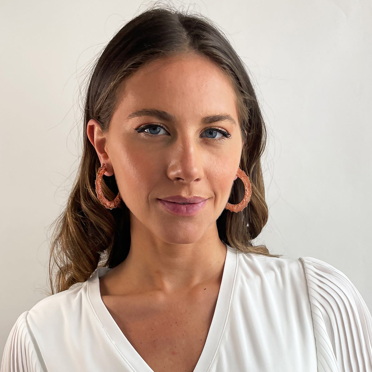 Juliette Lace Hoop Earrings Medium sized in rose gold on model.