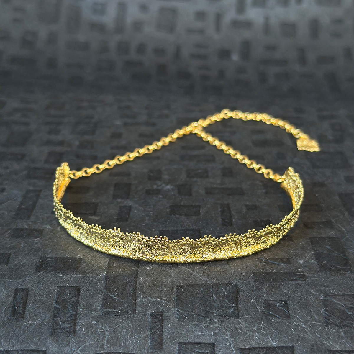 Leontine lace choker necklace in 24k gold.