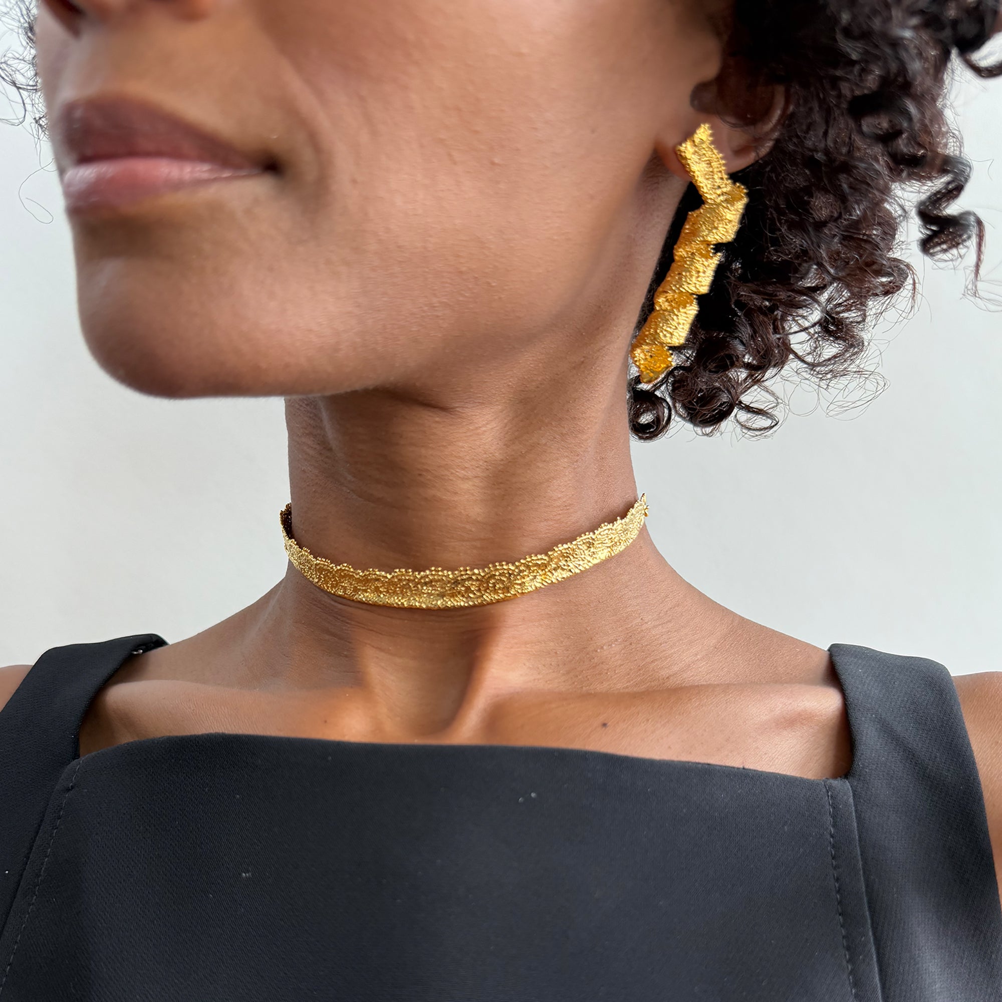 Azeline lace swirl and drop earrings in 24k gold.