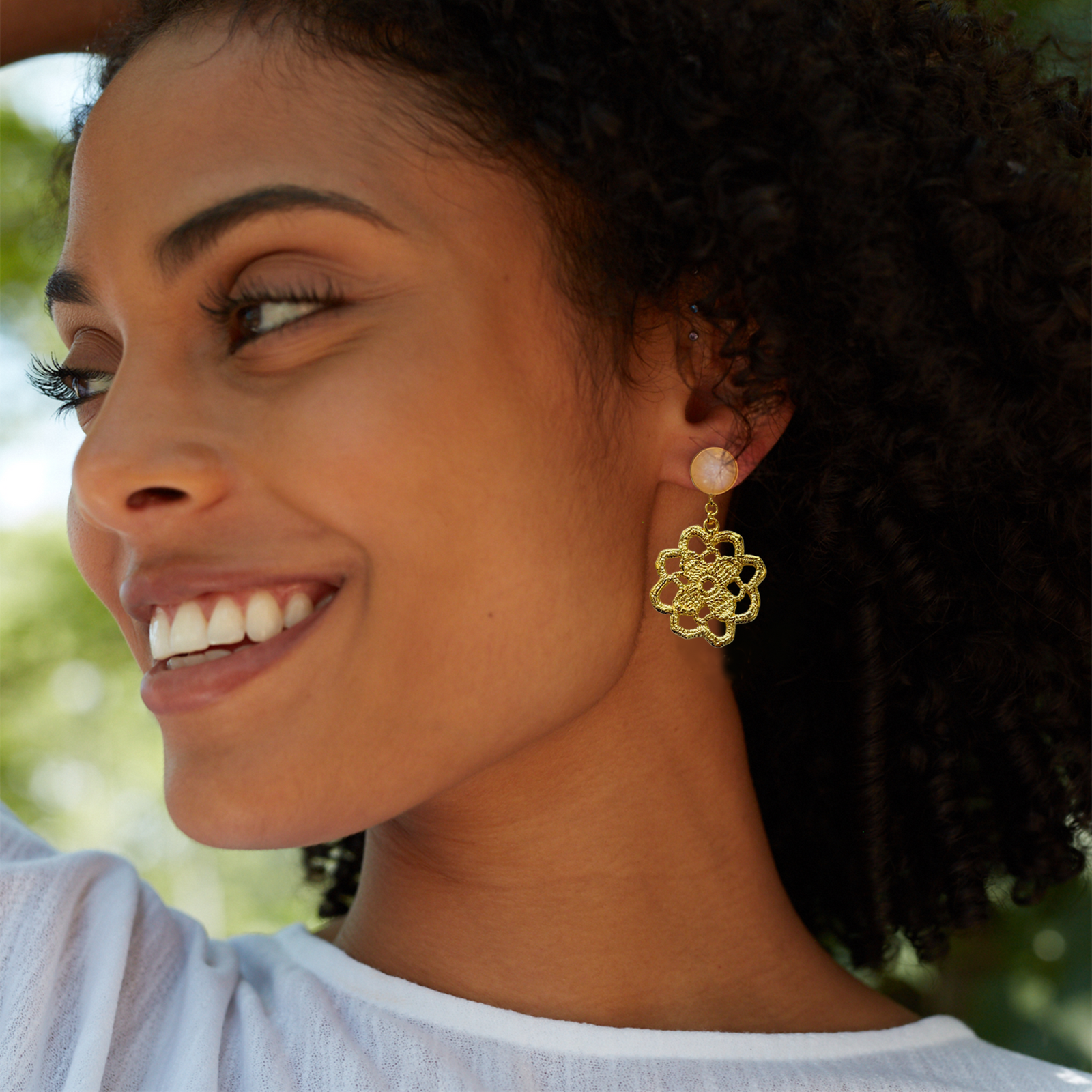 Lace flower earrings made from repurposed lace dipped in 24k gold with 10mm moonstone cabochons.