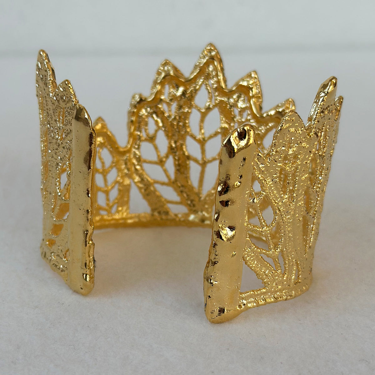 Lace leaf bracelet in dipped 24k gold.