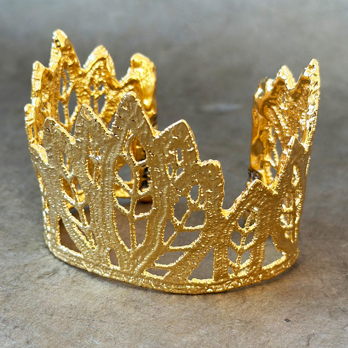 Lace leaf bracelet in dipped 24k gold.