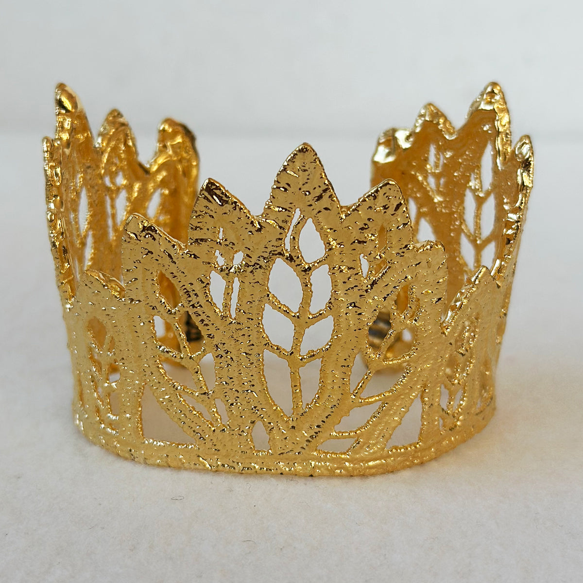 Lace leaf bracelet in dipped 24k gold.