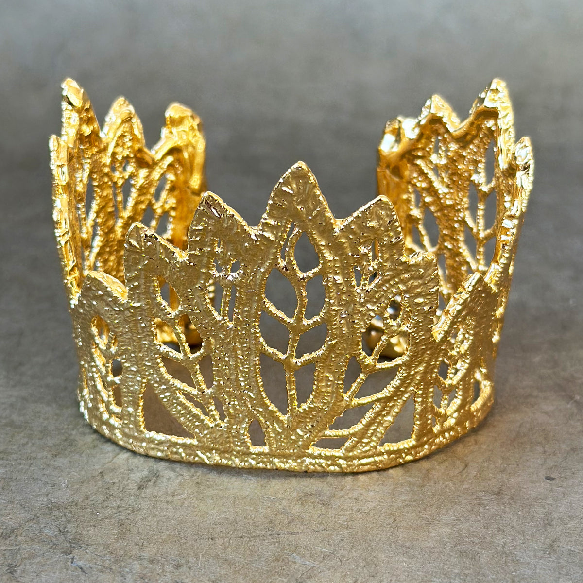 Lace leaf bracelet in dipped 24k gold.