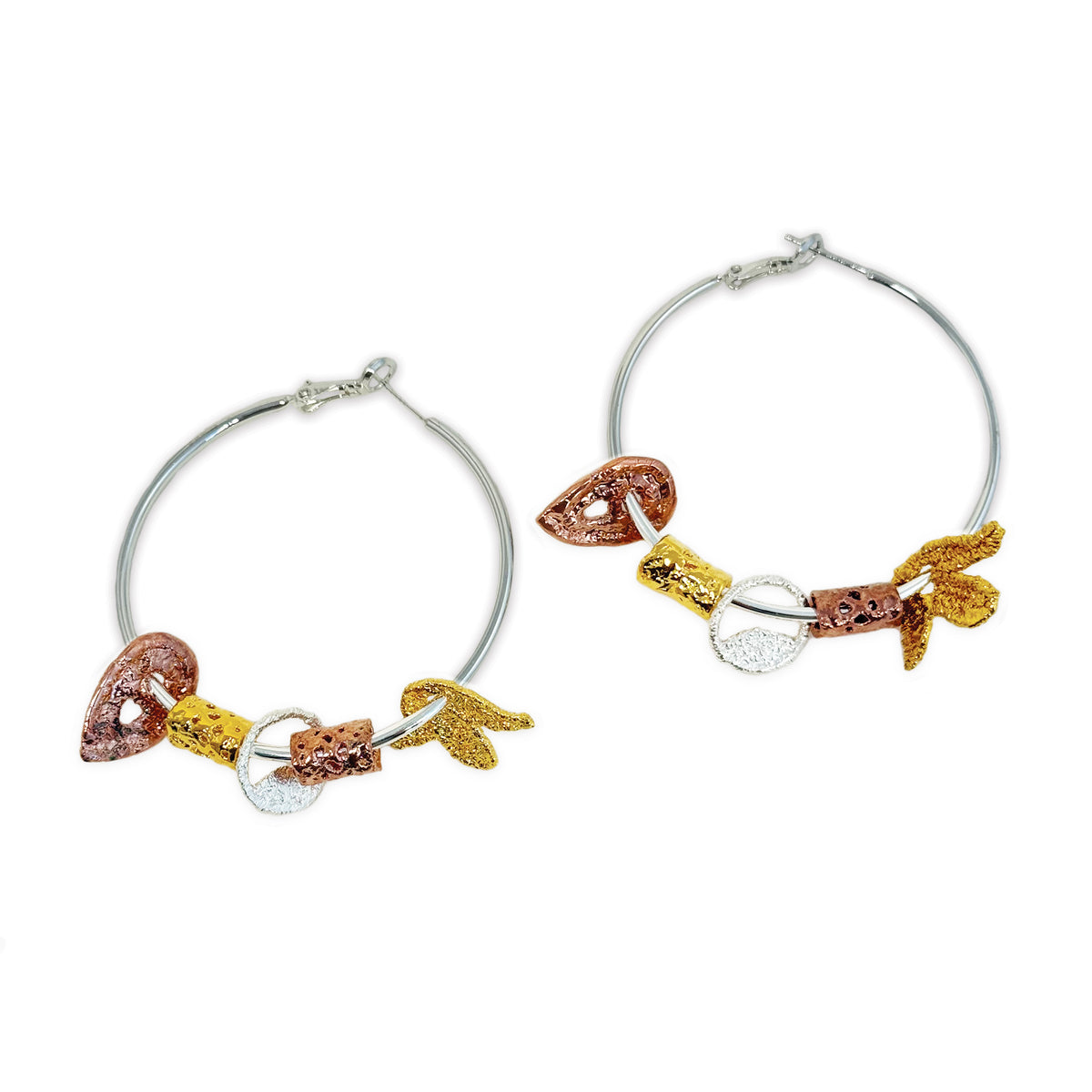 Pair of silver hoop earrings with lace charms dipped in 24k gold, rose gold and sterling silver.