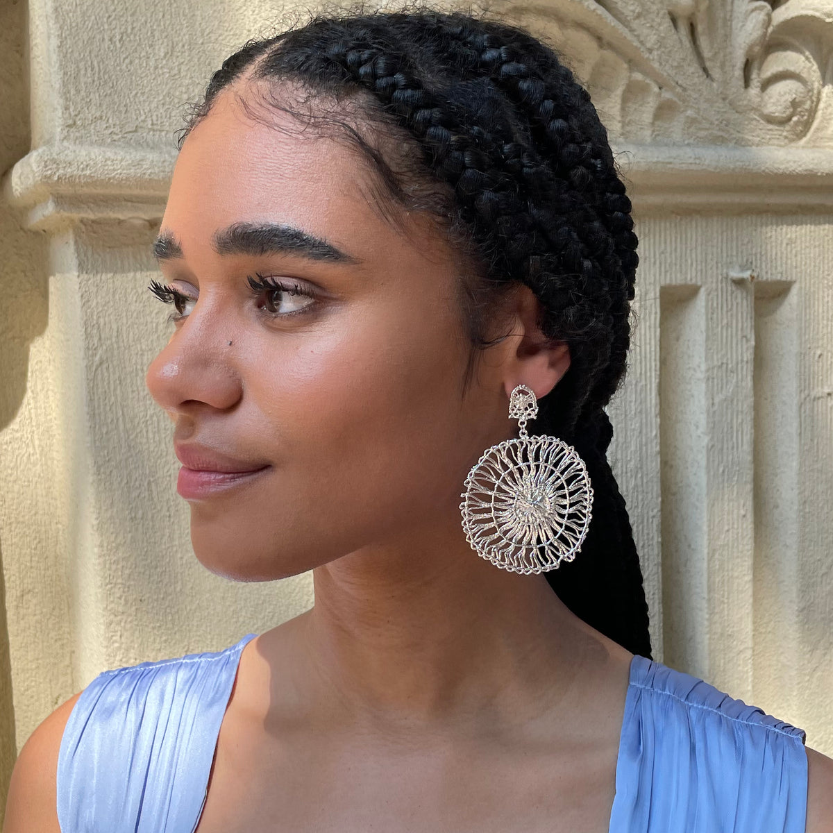 Circular lace pendant earrings made from Tenerife lace. Solidified in sterling silver.