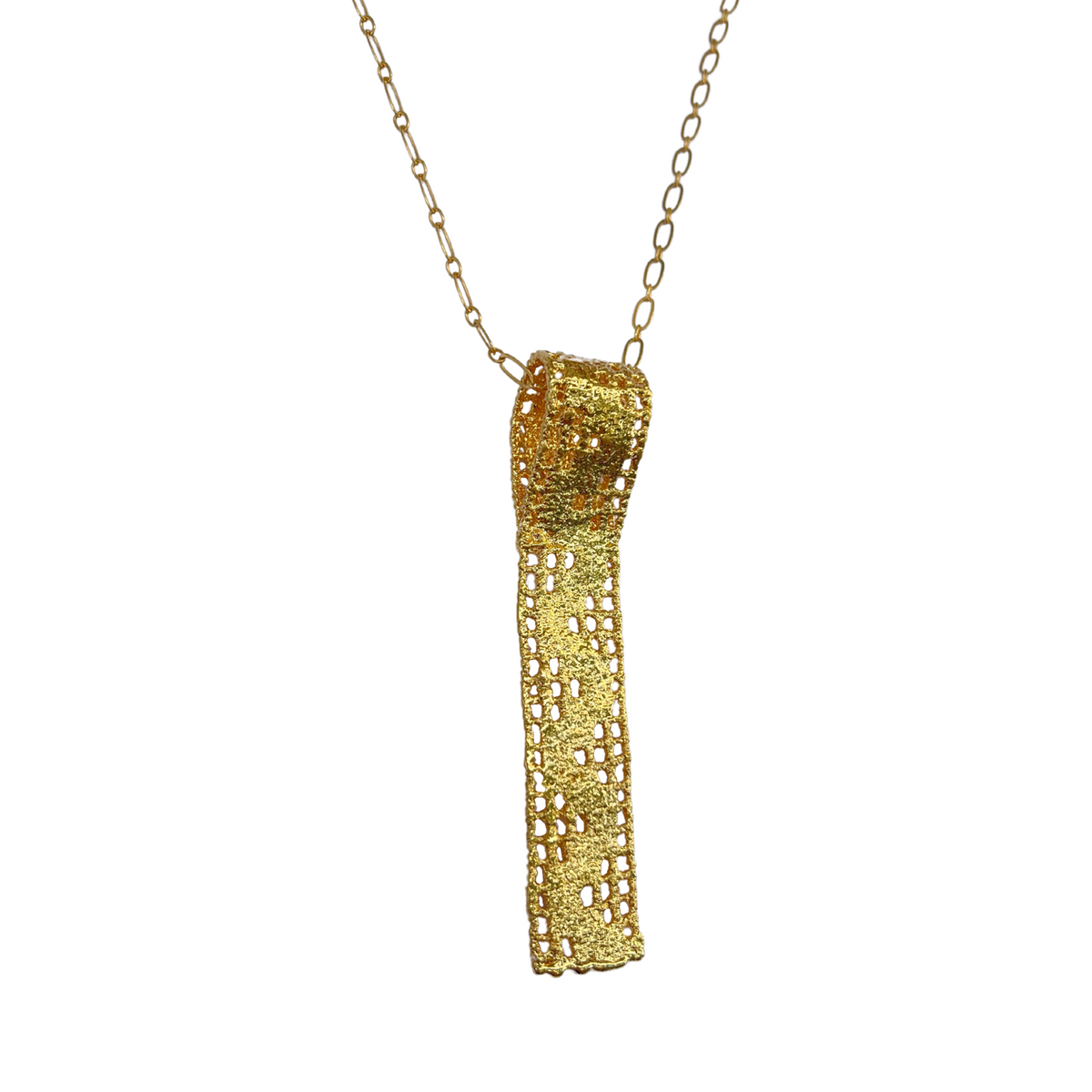Lace pendant necklace solidified in 24k gold.