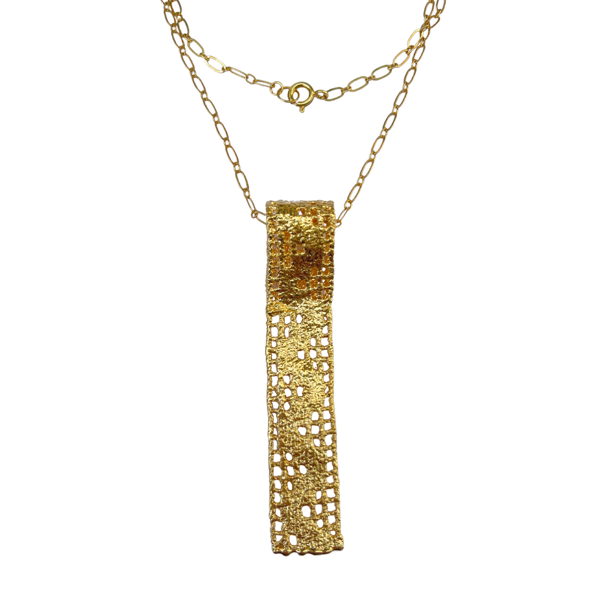 Lace pendant necklace solidified in 24k gold.