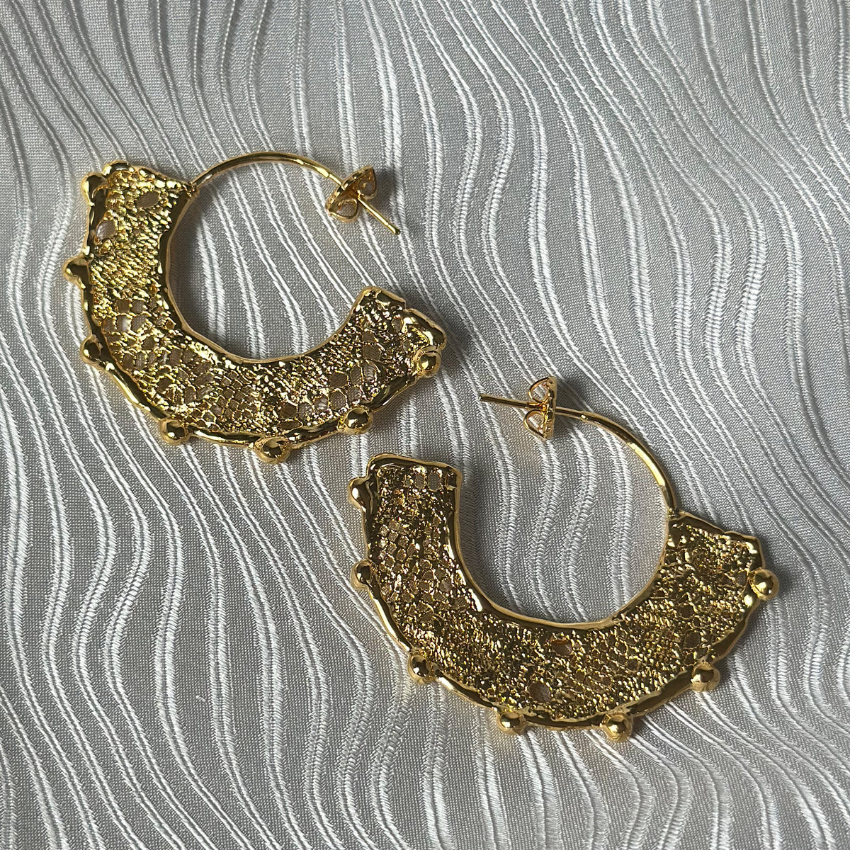 Violette 24k gold hoop earrings with intricate designs