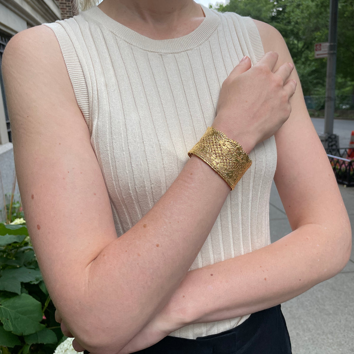 Gorgeous cuff bracelet made from French lace dipped in 24k gold, signed and numbered inside, on model.