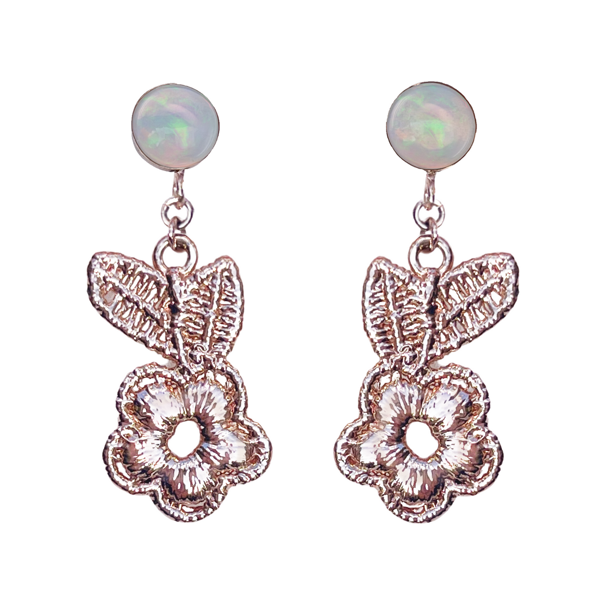 Flower lace earrings in rose gold with opals.
