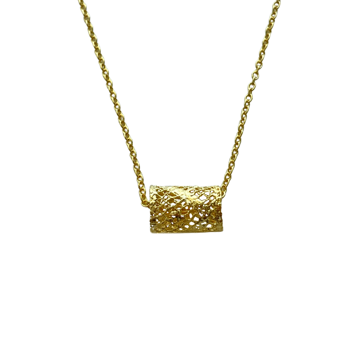 Small lace charm necklace with lace cylinder in 24k gold.