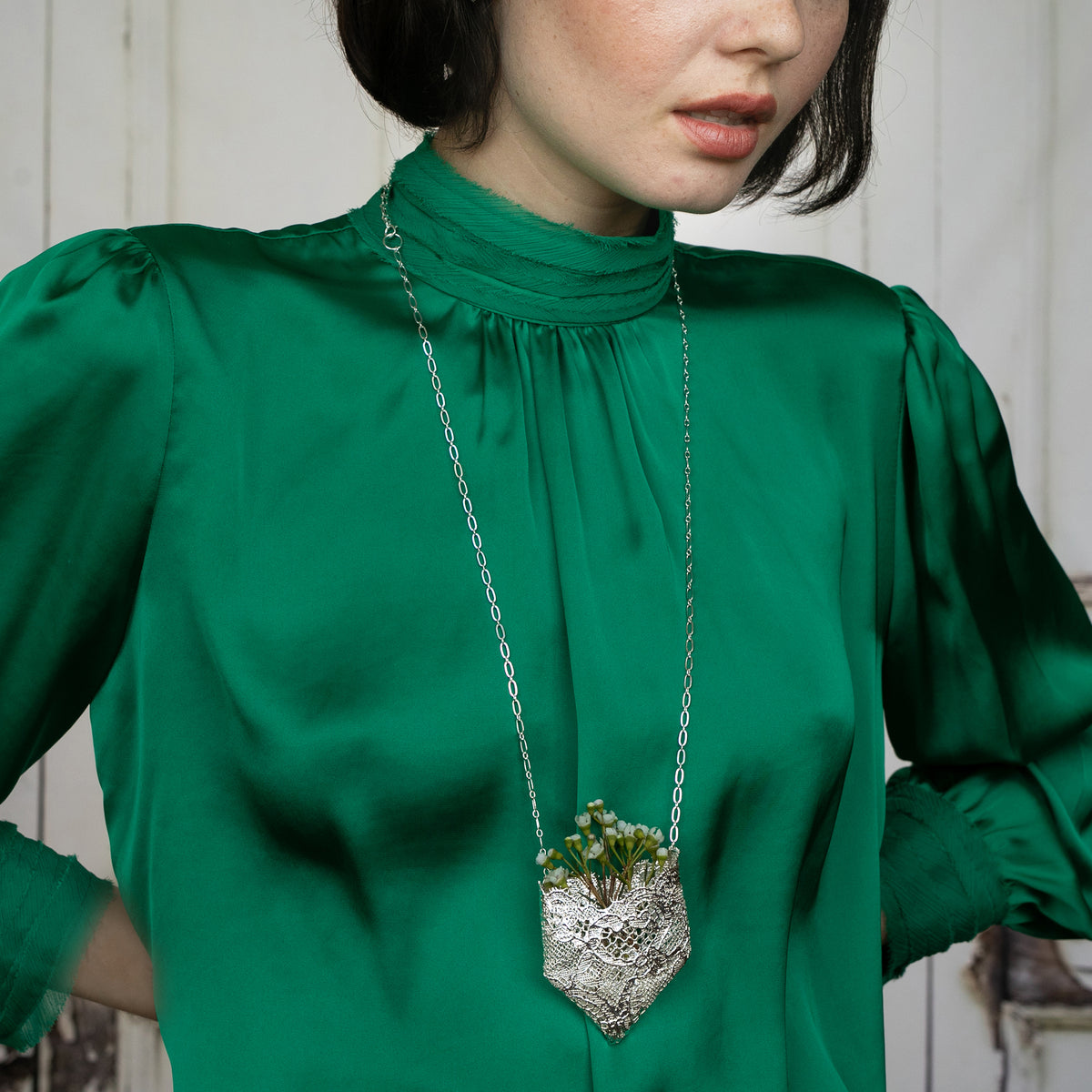 Model with Brooch and Necklace in one. Lace Jewelry dipped in Sterling Silver, Holder for flowers or fragrance sachet