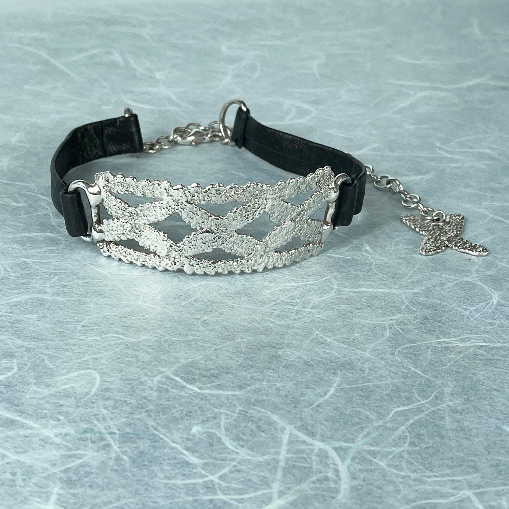Choker with leather and silver lace, chain and back pendant 