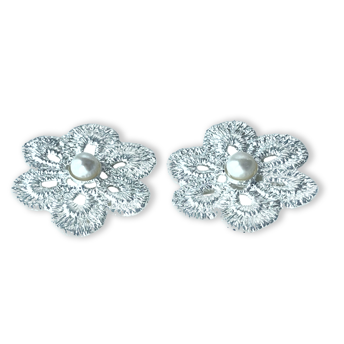 Pearl stud earrings with lace flower in sterling silver.
