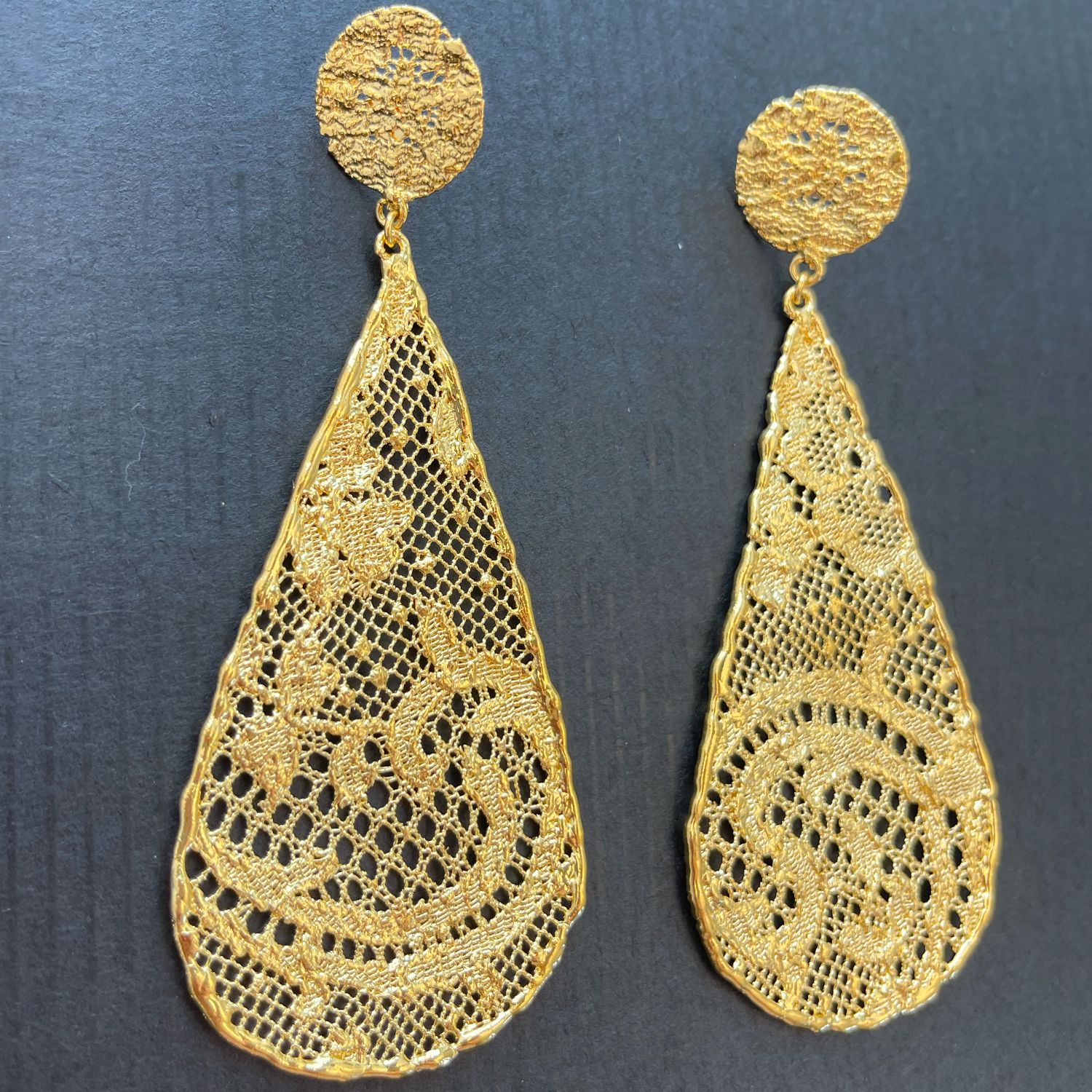 Large lace teardrop earrings dipped in 24k gold.