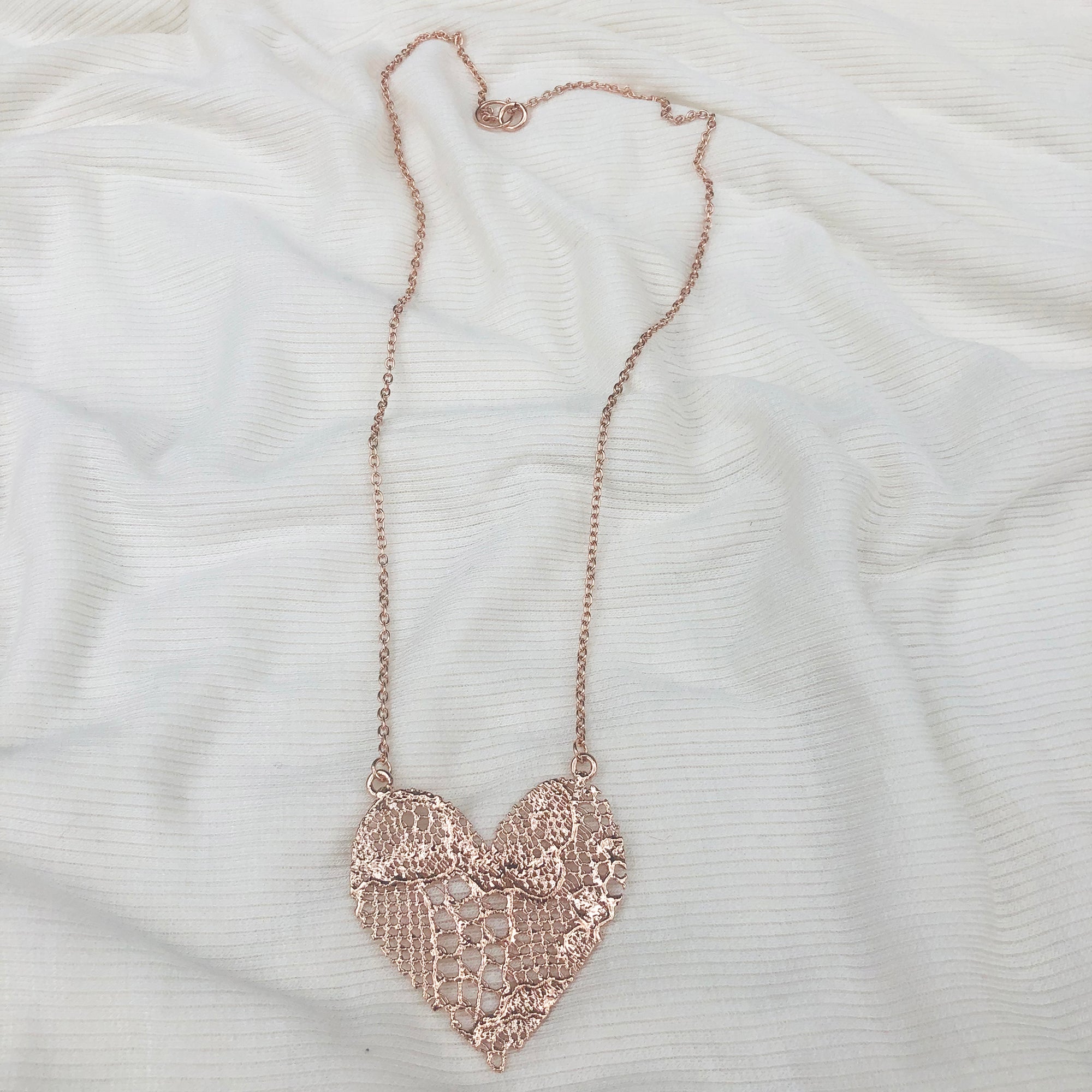 Lace Heart Necklace. 13th anniversary gift with a WOW factor. Made from European Chantilly lace dipped in rose gold.