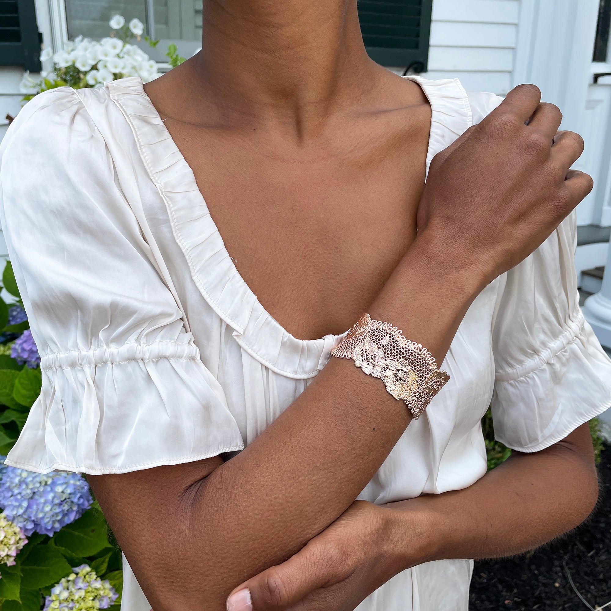 Donna lace cuff bracelet in rose gold. Double scalloped flower lace.