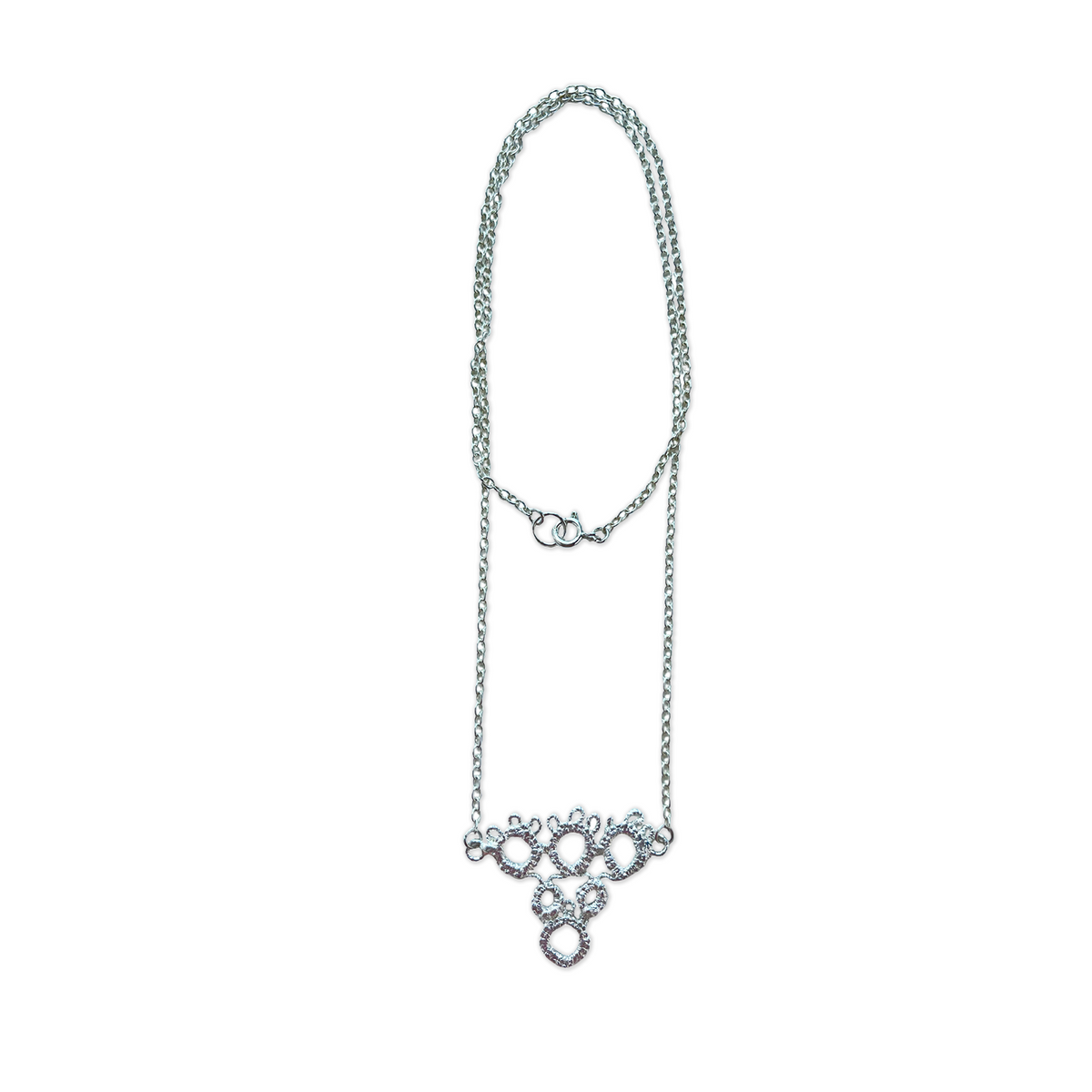 Irish tatted lace pendant necklace in sterling silver.